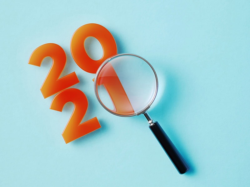 2021-numbers-with-a-magnifying-glass-symbolizing-a-look-back-at-the-year-2021. 2021-numbers-with-a-magnifying-glass-symbolizing-a-look-back-at-the-year-2021.