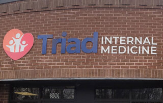 Triad-Internal-Medicine-Name-and-Logo-on-the-front-of-the-building-300-Mack-Rd-Suite-B,-Asheboro,-NC-27205.