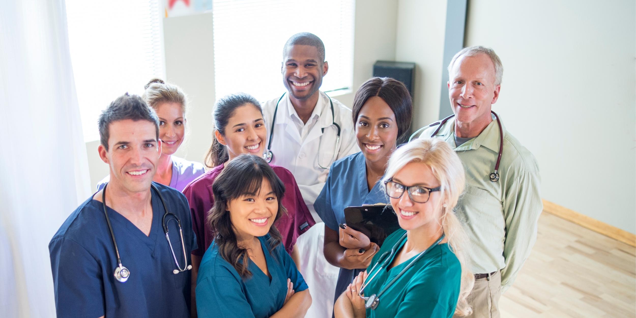 A primary care staff posing for a picture, representing Triad Primary Care in Greensboro, NC